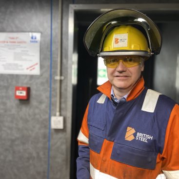 Chris Vaughan dressed in PPE