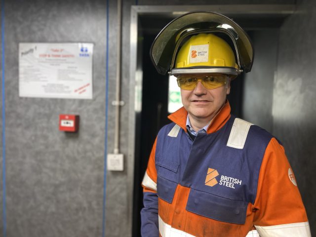 Chris Vaughan dressed in PPE